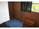 Small bedroom with twin bed and closet at 9338 Prevatt Ln, Hudson, FL 34667