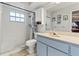 Bathroom with shower, toilet and vanity at 3077 Ardenwood Dr, Spring Hill, FL 34609