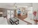 Open living area with view of kitchen and pool at 3077 Ardenwood Dr, Spring Hill, FL 34609