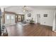 Bright living room featuring hardwood floors and a vaulted ceiling at 3077 Ardenwood Dr, Spring Hill, FL 34609