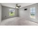 Bright bedroom with carpet and window at 3077 Ardenwood Dr, Spring Hill, FL 34609