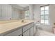 Bathroom with single sink and window at 3077 Ardenwood Dr, Spring Hill, FL 34609