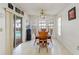 Bright breakfast nook with view of pool and sliding doors at 3077 Ardenwood Dr, Spring Hill, FL 34609