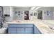 Bathroom with dual sinks and a large mirror at 3077 Ardenwood Dr, Spring Hill, FL 34609