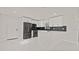 Modern kitchen features white cabinets, stainless steel appliances, and a large island at 18101 Mason Smith Rd, Brooksville, FL 34604