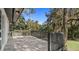 Spacious deck overlooking a tranquil wooded area at 18101 Mason Smith Rd, Brooksville, FL 34604