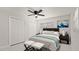 Bedroom with double doors and teal bedding at 18101 Mason Smith Rd, Brooksville, FL 34604