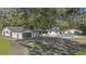 Aerial view of house, pool, and detached garage at 18101 Mason Smith Rd, Brooksville, FL 34604