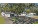 Aerial view of house, pool, and detached garage at 18101 Mason Smith Rd, Brooksville, FL 34604
