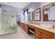 Spacious Primary bathroom with double sinks, a large shower, and updated fixtures at 13931 Chandron Dr, Odessa, FL 33556
