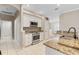 Updated kitchen with stainless steel appliances and granite countertops at 13931 Chandron Dr, Odessa, FL 33556