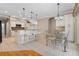 Kitchen features breakfast nook and access to the pool area at 13931 Chandron Dr, Odessa, FL 33556