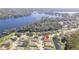 Aerial view showing home's location near a lake at 13931 Chandron Dr, Odessa, FL 33556