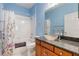Guest bathroom with shower/tub combo and updated vanity at 13931 Chandron Dr, Odessa, FL 33556
