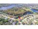 Aerial view of house location near a lake at 13931 Chandron Dr, Odessa, FL 33556