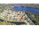 Aerial view of house location near a lake at 13931 Chandron Dr, Odessa, FL 33556