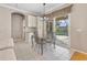 Bright breakfast nook with sliding doors leading to the pool at 13931 Chandron Dr, Odessa, FL 33556