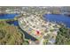 Aerial view showcasing home by the lake at 13931 Chandron Dr, Odessa, FL 33556