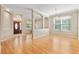 Spacious entryway with hardwood floors and views to the living and dining areas at 13931 Chandron Dr, Odessa, FL 33556