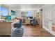 Home office with built-in shelving and hardwood floors at 10221 Elgin Blvd, Spring Hill, FL 34608
