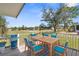 Wooden deck with seating area, providing a relaxing outdoor space at 10221 Elgin Blvd, Spring Hill, FL 34608