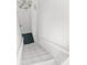 White painted staircase leading to the upper level at 10221 Elgin Blvd, Spring Hill, FL 34608