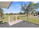 Wooden deck with open view of the backyard, offering serene views at 10221 Elgin Blvd, Spring Hill, FL 34608