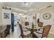Open concept dining area with kitchen view at 1847 Shore S Dr # 614, South Pasadena, FL 33707