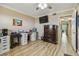 Spacious home office with large desk, dresser, and plenty of natural light at 1847 Shore S Dr # 614, South Pasadena, FL 33707