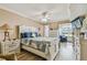 Main bedroom with water view and ceiling fan at 1847 Shore S Dr # 614, South Pasadena, FL 33707