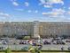Aerial view of a large apartment building with ample parking at 1847 Shore S Dr # 614, South Pasadena, FL 33707