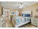 Bedroom with a white bed frame and ceiling fan at 1847 Shore S Dr # 614, South Pasadena, FL 33707