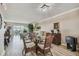 Bright dining area with glass-top table and wicker chairs at 1847 Shore S Dr # 614, South Pasadena, FL 33707