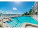 Refreshing community pool overlooking the water at 1847 Shore S Dr # 614, South Pasadena, FL 33707