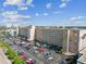Aerial view of an apartment building with a large parking lot and surrounding area at 1847 Shore S Dr # 614, South Pasadena, FL 33707