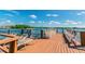 Community dock with seating for relaxing by the water at 1847 Shore S Dr # 614, South Pasadena, FL 33707