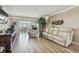Relaxing living room with a view, recliner, and wood flooring at 1847 Shore S Dr # 614, South Pasadena, FL 33707
