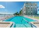 Inviting community pool with ample deck space at 1847 Shore S Dr # 614, South Pasadena, FL 33707