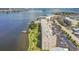 Aerial view of waterfront condo building with parking and surrounding buildings at 1847 Shore S Dr # 614, South Pasadena, FL 33707