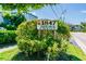 Shorecrest community entrance sign with landscaping at 1847 Shore S Dr # 614, South Pasadena, FL 33707