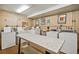 Community laundry room with several washers and dryers at 1847 Shore S Dr # 614, South Pasadena, FL 33707