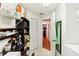 Laundry room with built-in shelving and access to other rooms at 8088 Spanish Oak Dr, Spring Hill, FL 34606