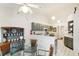 Eat-in kitchen features a breakfast bar and updated cabinets at 8088 Spanish Oak Dr, Spring Hill, FL 34606