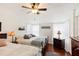 Bedroom with two twin beds and ceiling fan at 8088 Spanish Oak Dr, Spring Hill, FL 34606