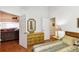 Bedroom with wood floors and dresser at 8088 Spanish Oak Dr, Spring Hill, FL 34606