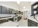 Bright kitchen with ample cabinetry and modern appliances at 8088 Spanish Oak Dr, Spring Hill, FL 34606