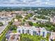 Condo building in a lush landscape, aerial view at 2424 W Tampa Bay Blvd # L-302, Tampa, FL 33607
