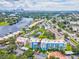 Aerial view of condo building near water, showing building features at 2424 W Tampa Bay Blvd # L-302, Tampa, FL 33607