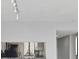 Kitchen features granite countertops and track lighting at 2424 W Tampa Bay Blvd # L-302, Tampa, FL 33607