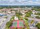 Aerial view of tennis courts near shopping and businesses at 2424 W Tampa Bay Blvd # L-302, Tampa, FL 33607